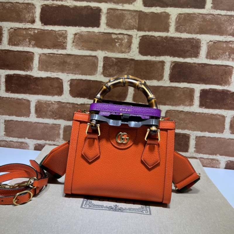 G*u*i top handle bags